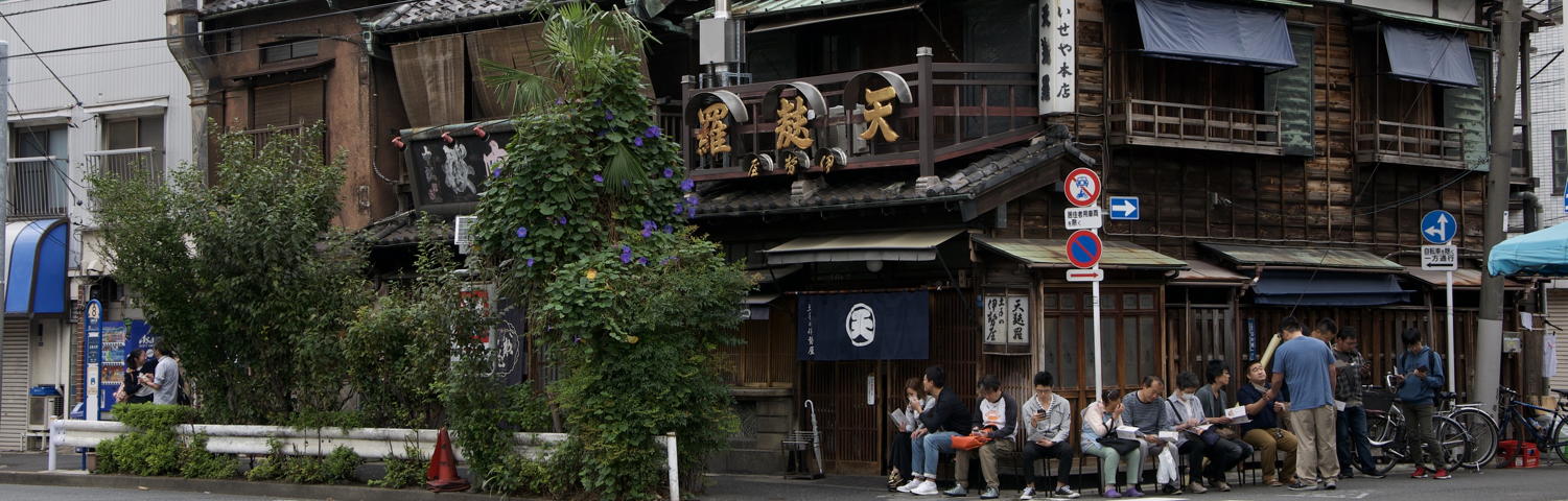 People waiting for a seat at a restaurant